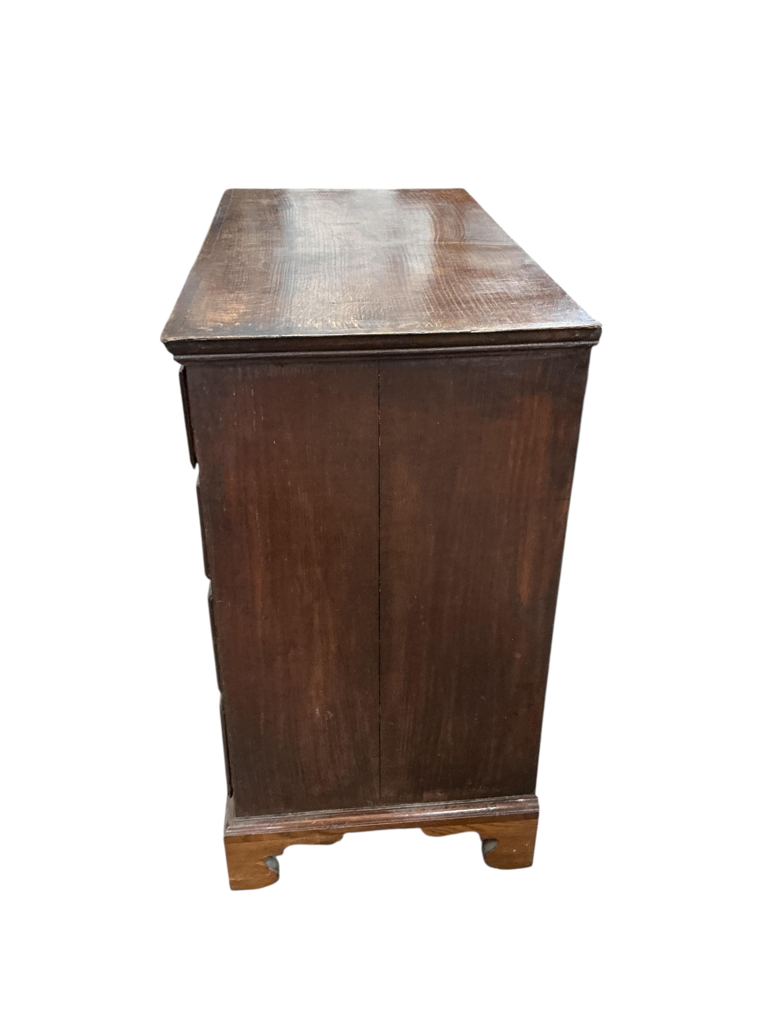 A George III oak chest of drawers, width 94cm, depth 49cm, height 91cm